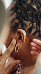 Doctor, hearing aid or old woman with disability in hospital for consultation, healthcare or support. Nurse, senior deaf person or patient with audio implant for sound waves, medical help or checkup.