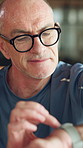 Fitness, old man or happy with smart watch in home for workout performance, cardio results or stats. Elderly person, health app and pride in house for exercise progress, monitor heart rate and timer