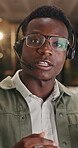 Call center, face and talking with business black man in office for communication, contact us and night. Virtual advisor, discussion and customer service with person or agent for overtime help desk