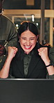 Night, fist pump and business people with laptop for celebration, achievement or winning together. Feedback, approval and design team with person online for deadline, goal or support with flare
