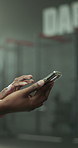 Exercise, hands and phone with woman in gym for health, training schedule or workout tracking. App, social media and text message with athlete in fitness club for communication or progress update