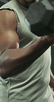 Weightlifting, dumbbell and arm with man in gym for intense workout, bicep curl or health. Exercise, wellness and bodybuilding challenge with person in sports club for strong, athlete and training