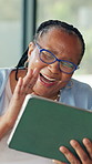 Tablet, video call and elderly woman wave, greeting and send love in home. Happy black person, senior and virtual chat with tech for online conversation, kiss and hello with connection in retirement