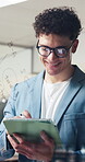 Typing, glass wall or man in office with tablet, glasses or brainstorming for business proposal. Tech, smile or marketing consultant in agency with board, reflection or planning for report review.