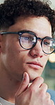 Glasses, statistics and thinking with business man in financial workplace for review of data. Computer, eyewear and reflection with person reading charts or graphs in office for finance report