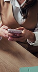 Woman, hands or typing with phone in workplace for text message, social media or communication. Person, research or networking with tech for online conversation, browsing internet or mobile app chat.