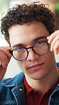 Face, creative and man with glasses in office for career pride, prescription and optical health. Portrait, male person and about us, new frames and eye care for eyesight wellness in workplace