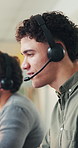 Conversation, headset and support with man in call center for assistance, contact us or virtual help. Communication, customer service and feedback with person in coworking office for consulting