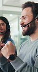 Telemarketing, businessman and fist pump in office with smile for success, sales goal or achievement. Happy person, applause or thumbs up in call center with celebration for bonus, win or milestone.