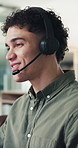 Consulting, headset and support with man in call center for assistance, contact us or virtual help. Conversation, customer service and feedback with person in coworking office for communication