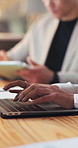 Hands, laptop and business person typing in office for accounting, audit or review. Woman, coworking and accountant with computer in workplace for budget report, bookkeeping and financial planning