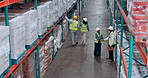 Above, supply chain and people in warehouse, handshake and storage inspection with export. Shaking hands, distribution and employees in factory, manufacturing and agreement for import and logistics