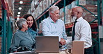 Warehouse, team and people on laptop with handshake for welcome to meeting, planning and logistics. Distribution, shaking hands and happy workers on computer for supply chain, production and shipping