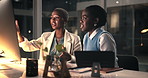 Computer, conversation and businesswomen in office at night for planning finance report with deadline. Meeting, technology and African female financial advisors working on company investment proposal