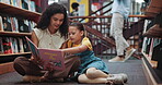 Child, teacher and reading a book in library for language skills, test preparation or literature lesson. Education, girl or tutor with novel on floor for cognitive development, story quiz and support