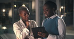 Overtime, manager and woman with tablet in office, feedback meeting or discussion of investment proposal. Night, director and people with tech in workplace, ideas and advice for finance presentation.