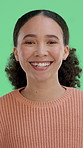 Smile, face of woman and laughing on green screen for funny humor, comic joke and positivity. Cheerful, person and happy on studio background for comedy, good mood and confidence with stress relief