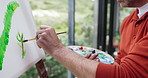 Hands, person and painting on canvas at house for drawing, watercolor and nature sketch for artwork. Mature artist, window and outdoor inspiration for scenery picture, art creation and creative hobby