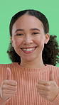 Face, happy woman and thumbs up on green screen for agreement, yes or success in studio. Portrait, smile and model with like hand gesture for feedback sign, recommendation or thank you on background