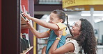 Searching, mother and girl in library, lifting and education with growth, learning and choice Family, parent and mama with daughter, support and knowledge with child development, books and help