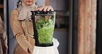 Hands, muslim couple and green smoothie in blender for breakfast shake, digestive health and detox. Islamic people, hug and vegetable beverage in home for meal replacement, nutrition and weight loss