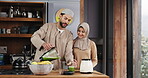 Blender, muslim couple and green smoothie in kitchen for breakfast shake, digestion or health benefits. Islamic people, love and pour beverage in home for nutrition, meal replacement and conversation