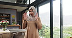 Prayer, woman and home for muslim religion, worship and praise to God with mindfulness and gratitude. Spiritual, faith and person bow in islam for peace, hijab and culture while praying in house