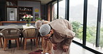 Muslim couple, home and prayer with bow for worship, religion or spiritual faith for Ramadan Kareem. Islamic man, woman and praying together in living room for holy, peace and praise Allah in house