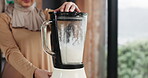 Muslim, hands and woman with smoothie in blender for breakfast shake, digestive health and detox. Islamic person, machine and beverage preparation in home for meal replacement, healthy diet and space