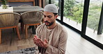 Above, muslim and praying with man at house for gratitude, islamic faith and worship Allah on Eid. Male person, prayer and dua with spiritual belief, religious devotion and praise to God of tradition
