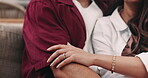 Love, hands and couple with romance on sofa for bonding together, affection and healthy relationship. Relax, people and touch in home for connection, marriage commitment and appreciation on weekend