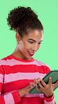 Happy, woman and student with tablet in studio for research, education results and scholarship. Smile, person and digital for online learning, study schedule and university portal on green background