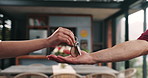 Hands, keys and realtor in new house with deal, mortgage or sale for moving with property investment. People, customer and real estate agent with service for agreement, rent and relocation at home