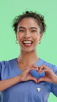 Hand heart, nurse or woman face with green screen, health insurance or medical provider advertising. Reliable coverage, service plan or happy person in studio with love emoji, agreement and like sign