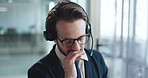 Headset, stress and businessman in office with customer service, communication or crm. Call, frustration and male technical support consultant with mic for online query with contact us in workplace.
