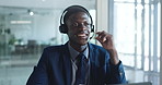 Laptop, man and consulting with headset in call center for online help, account management and FAQ. Customer service agent, black person or speaking to client for inbound query, assistance or support