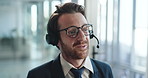 Headset, talking and businessman in office with customer service, communication or crm. Call, helpdesk and male technical support consultant with mic for online query with contact us in workplace.