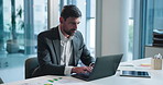 Laptop, typing and businessman in office with research for finance report with company budget. Computer, reading and financial manager working on investment proposal with stock market in workplace.