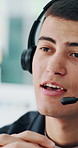 Explain, smile and support with man in call center for advice, help or virtual assistance. Communication, consulting and headset with happy agent in customer service office for feedback or solution