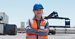 Face, shipping and woman with arms crossed, smile and logistics with export, hard hat and cargo. Outdoor, mature person and employee with pride, confident and distribution with safety and happiness
