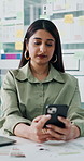 Phone, contact and businesswoman in office with communication, networking or connectivity online. Research, technology and female designer with texting on mobile app with cellphone in workplace.
