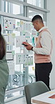 Glass wall, business people and tablet in meeting for ux design, ui layout and interface planning. Team, documents and paperwork with wireframe for user experience, app template and display ideas