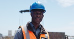Face, logistics and black man with hard hat, shipping yard and distribution with export. African person, outdoor and employee with helmet, import and industry with global trade and supply chain 