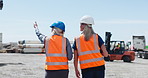 Women, team and walk at port with logistics, clipboard and discussion with point for freight shipping. People, back and review checklist with supply chain, planning or export distribution at harbor