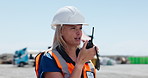 Engineer, talking and woman with radio on construction site for communication, inspection or planning. Architecture, contractor and person with instruction for building project, renovation and update