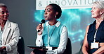 Tablet, microphone and stage with business woman at conference for finance summit, innovation and seminar. Tradeshow symposium, digital speech and broker convention with employees for expo event