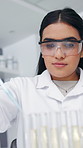 Woman, scientist and pipette with test tube in lab for research, medical study and testing liquid. Below, female person and chemical for experiment, biotechnology and specimen for vaccine development