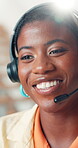 Black woman, talking and headset at call centre for consultation, customer support and advice. Smile, female agent and lens flare with guidance for crm, telecom and help client with online assistance