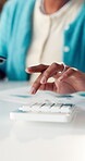 Hands, business woman and calculator in office for revenue forecasting, company valuation and ROI. Financial analyst, data and tech at desk for performance reporting, cash flow analysis or budgeting