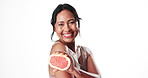 Face, skincare and happy woman squeeze grapefruit for vitamin c, glow or laugh. Mature model, organic fruit and natural beauty, anti aging or funny portrait on white background mockup space in studio